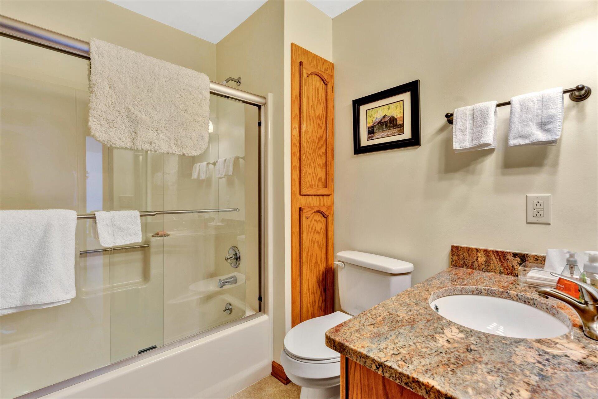 515 Cedar Ridge Road Union Hall, VA 24176 - Photo 22 of 51 a bathroom with a granite countertop sink toilet and shower