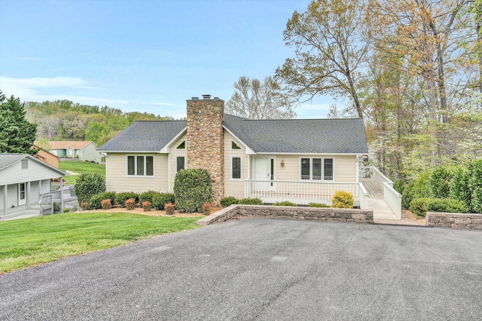 515 Cedar Ridge Road Union Hall, VA 24176 - Photo 3 of 51 front view of a house with a yard