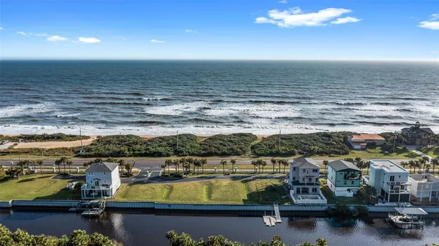 a view of a swimming pool with lounge chair