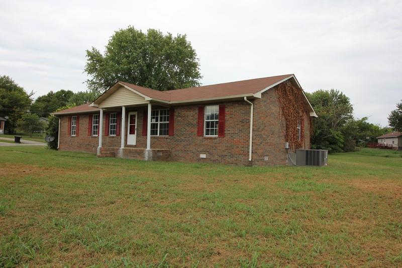 488 Hugh Hunter Road Oak Grove, KY 42262 - Photo 2 of 10 a view of a house with a backyard