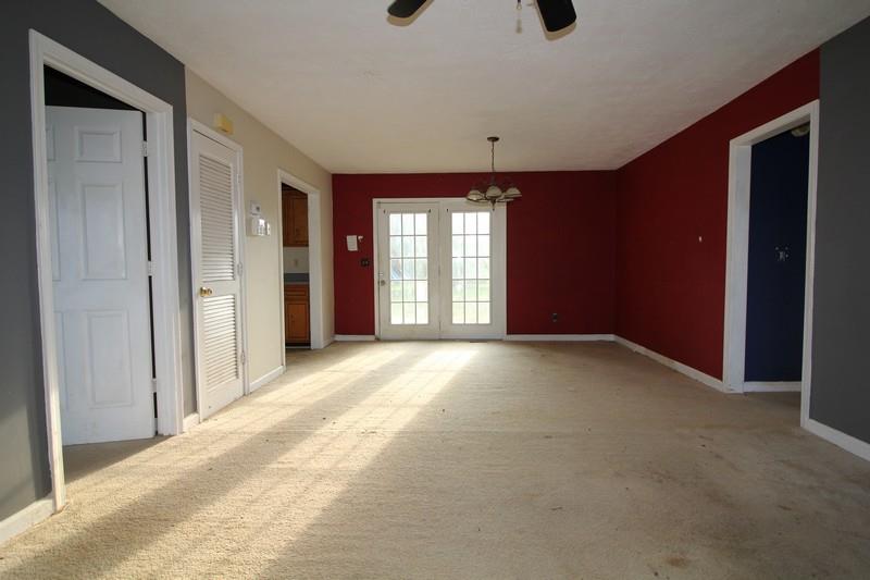 488 Hugh Hunter Road Oak Grove, KY 42262 - Photo 3 of 10 an empty room with windows