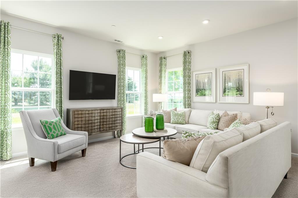 5205 Spruce Road Gibsonia, PA 15044 - Photo 3 of 6 a living room with furniture and a flat screen tv