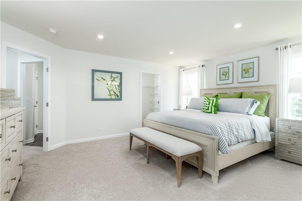 5205 Spruce Road Gibsonia, PA 15044 - Photo 5 of 6 a spacious bedroom with a bed and painting on the wall