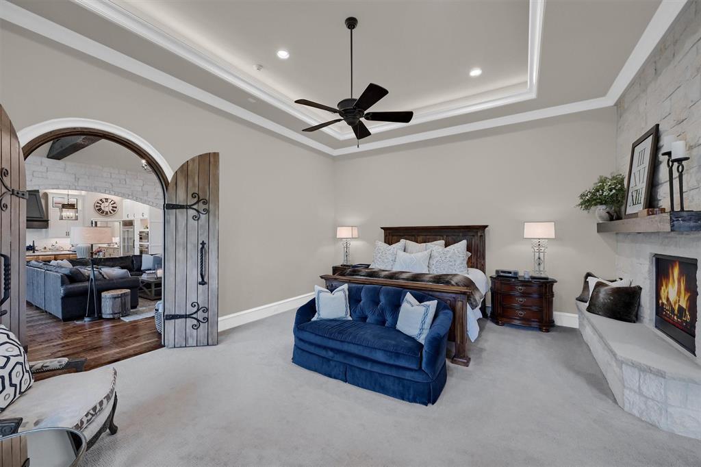 8301 Stephens Ranch Road Pilot Point, TX 76258 - Photo 21 of 40 a bed room with furniture and a ceiling fan