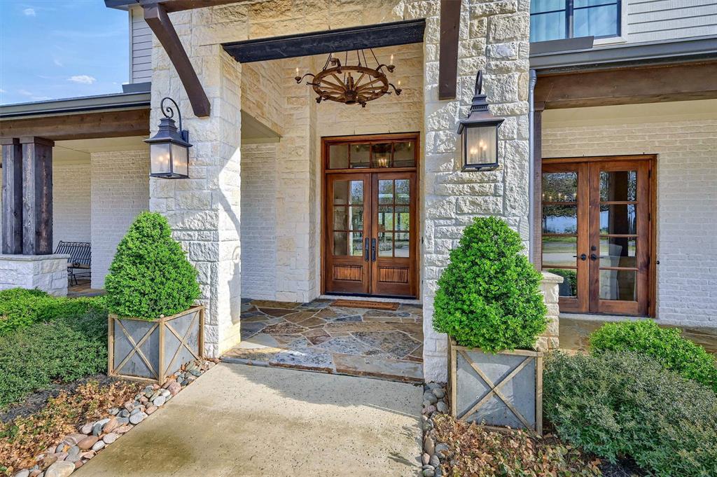 8301 Stephens Ranch Road Pilot Point, TX 76258 - Photo 5 of 40 a front view of a house