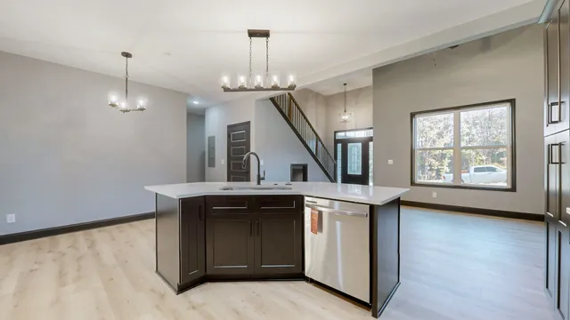 a view of a kitchen with a sink cabinets and window