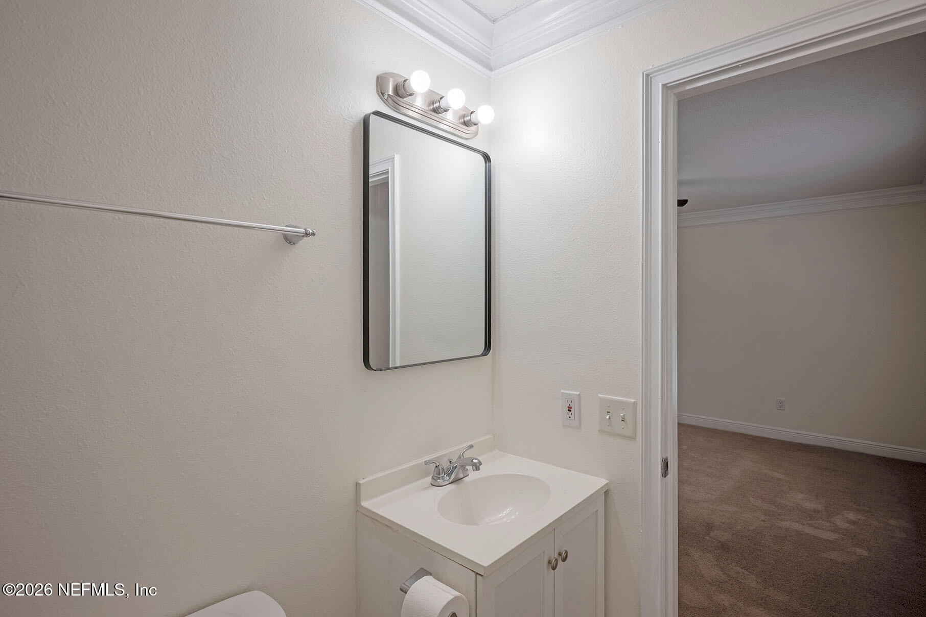 430 Southwest Jasmine Avenue Keystone Heights, FL 32656 - Photo 33 of 37 a bathroom with a sink and a mirror
