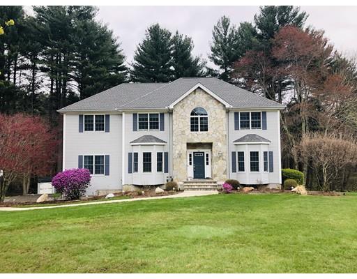 22 Battle Flagg Road Bedford, MA 01730 - Photo 1 of 30 a front view of a house with garden