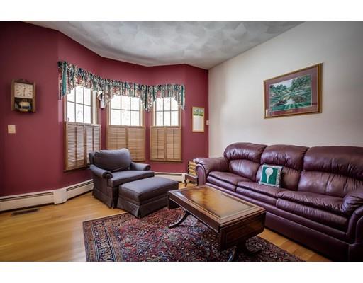 22 Battle Flagg Road Bedford, MA 01730 - Photo 16 of 30 a living room with furniture and a window