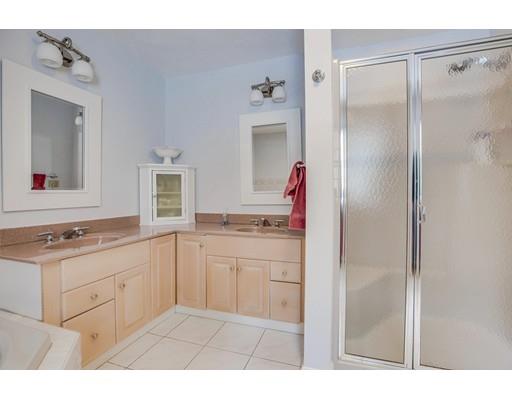 22 Battle Flagg Road Bedford, MA 01730 - Photo 21 of 30 a kitchen with a sink and refrigerator