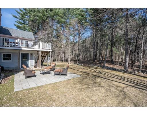 22 Battle Flagg Road Bedford, MA 01730 - Photo 29 of 30 a view of a house with backyard porch and sitting area