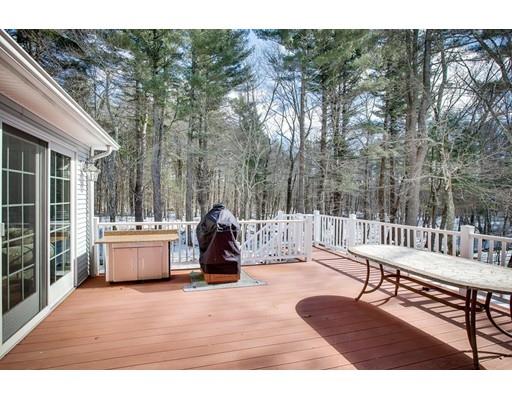 22 Battle Flagg Road Bedford, MA 01730 - Photo 30 of 30 a view of a roof deck with couches and sky view