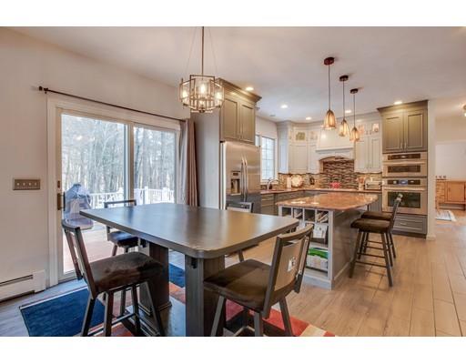 22 Battle Flagg Road Bedford, MA 01730 - Photo 7 of 30 a view of a dining room with furniture window and wooden floor