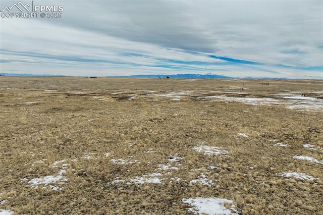 32290 North Neely Road Yoder, CO 80864 - Photo 22 of 26 View of water feature with a mountain view