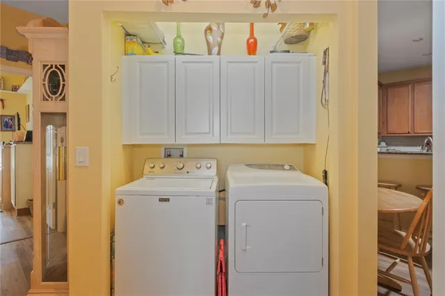 a utility room with dryer and washer
