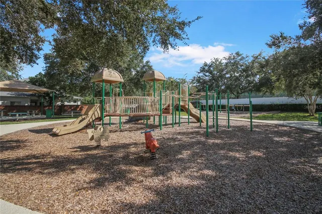a view of a park with swings