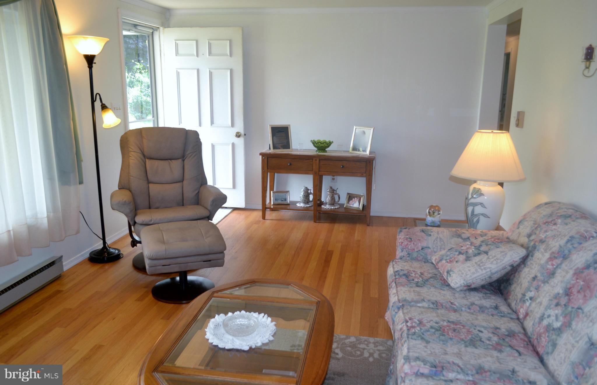3424 Warehime Road Manchester, MD 21102 - Photo 3 of 26 a living room with furniture and a wooden floor