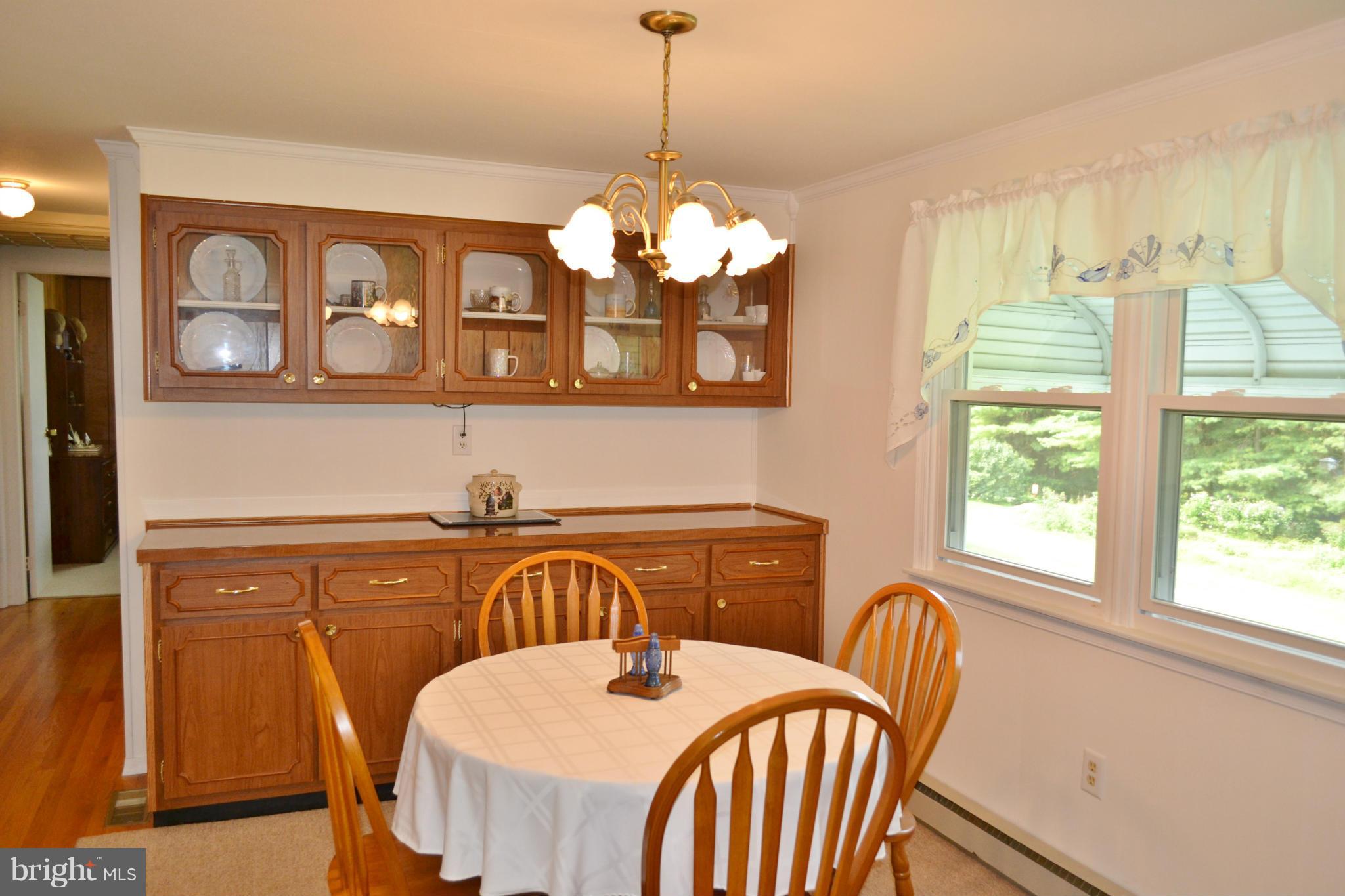 3424 Warehime Road Manchester, MD 21102 - Photo 4 of 26 a view of a dining room with furniture window and outside view