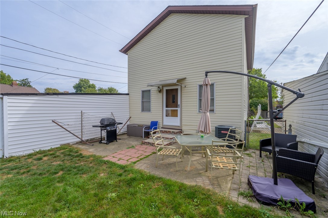 6132 North Canterbury Road Parma, OH 44129 - Photo 7 of 34 Back of house with a patio