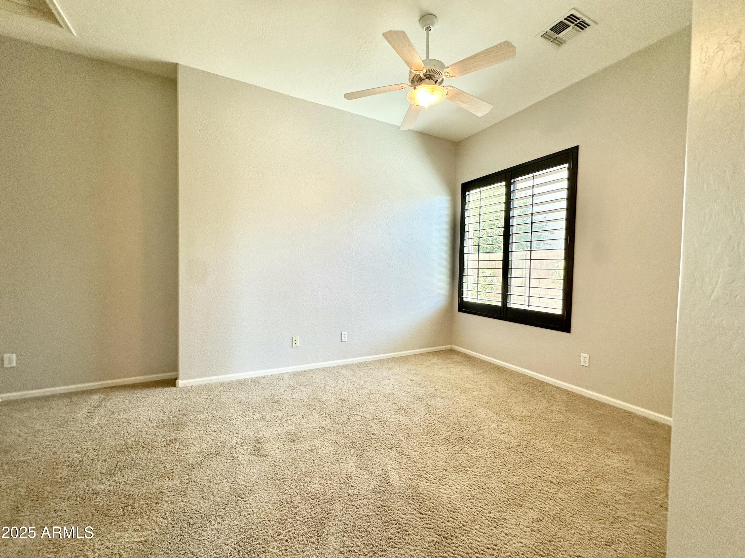 6562 South Crestview Drive Gilbert, AZ 85298 - Photo 15 of 23 an empty room with a window
