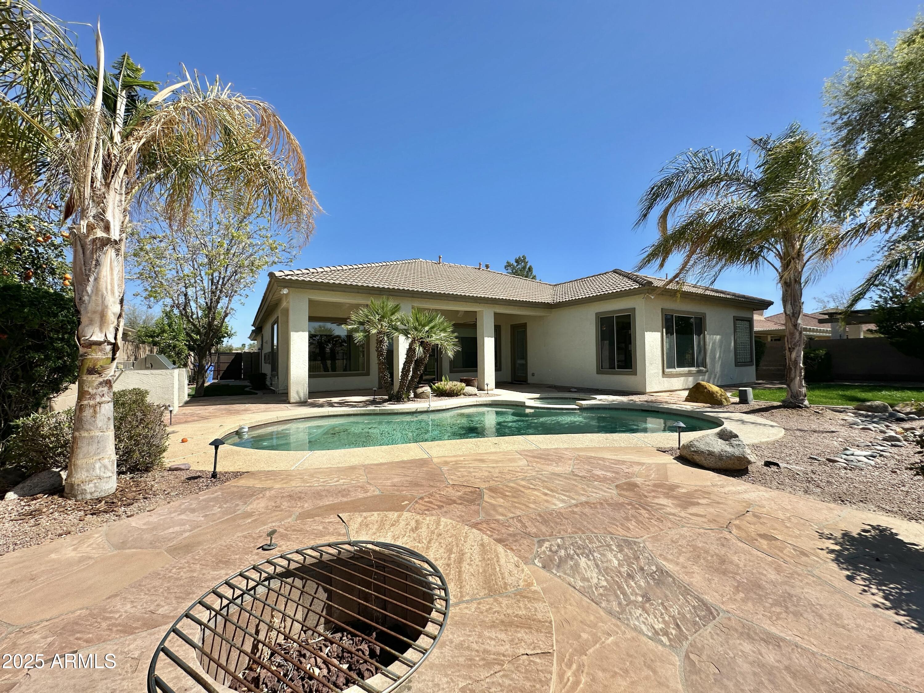 6562 South Crestview Drive Gilbert, AZ 85298 - Photo 3 of 23 a view of a house with backyard and sitting area