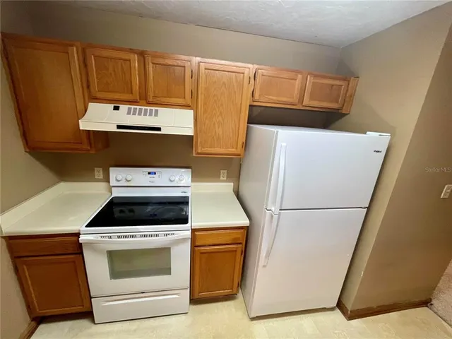 a bathroom with a toilet a sink and bathtub