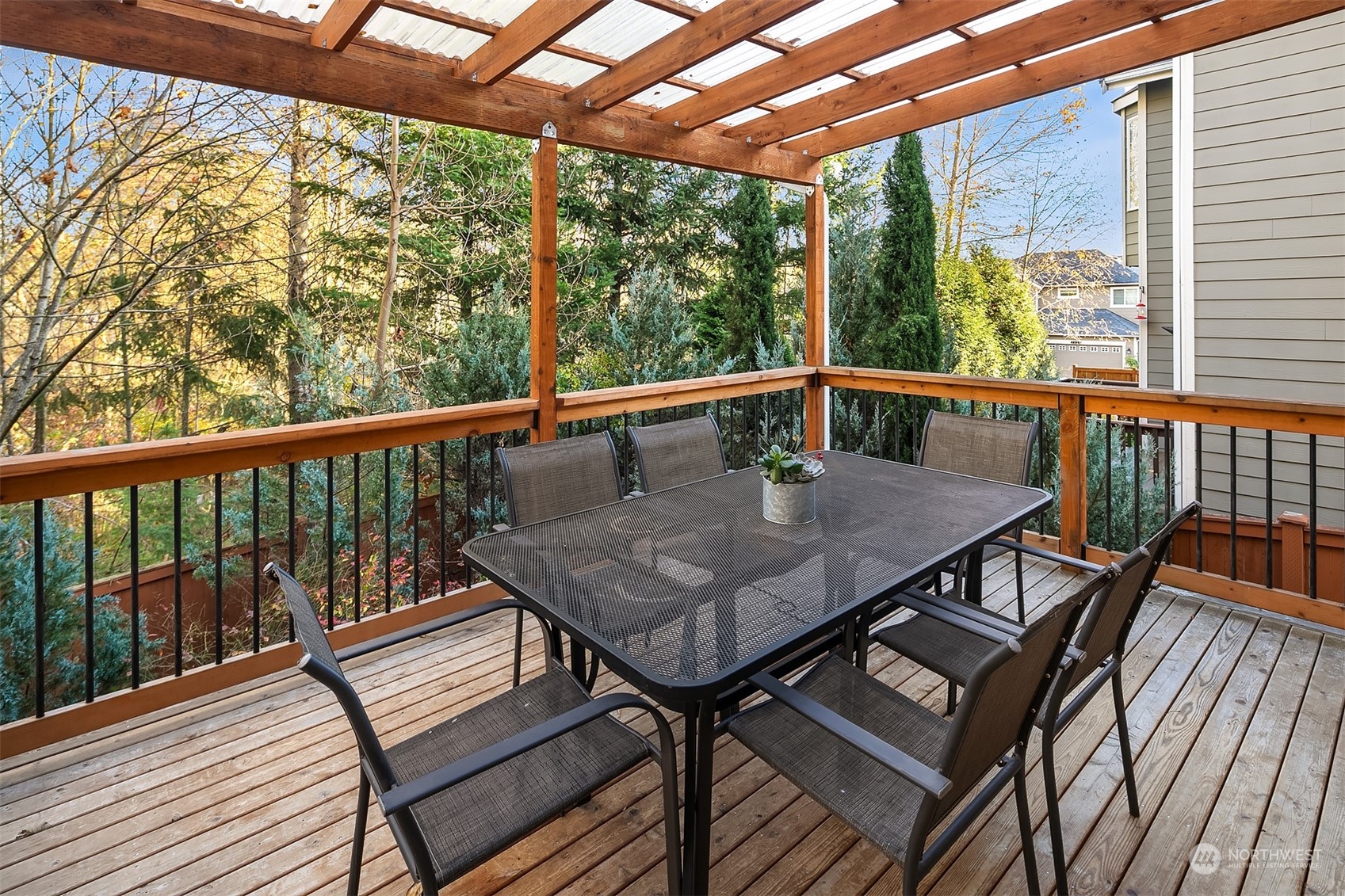 20012 79th Avenue Northeast Kenmore, WA 98028 - Photo 15 of 35 a view of balcony with wooden floor and outdoor seating