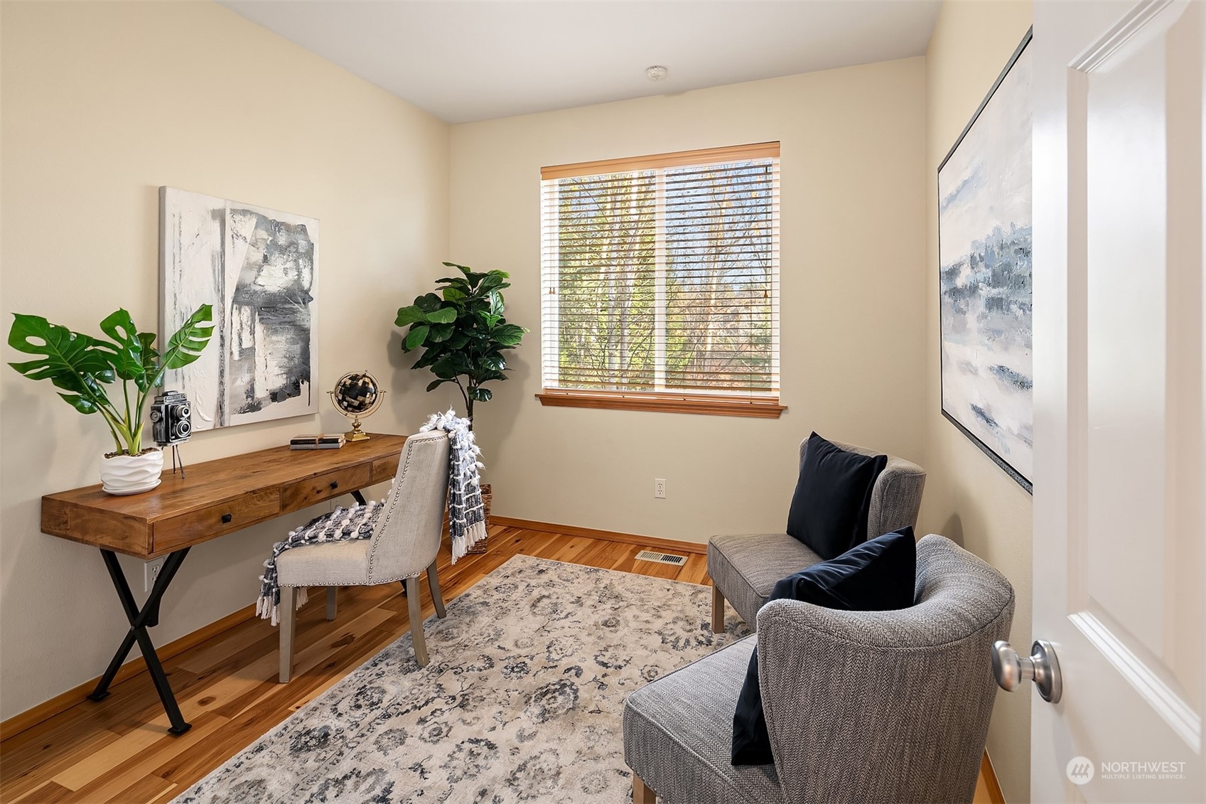20012 79th Avenue Northeast Kenmore, WA 98028 - Photo 18 of 35 a living room with furniture and a potted plant