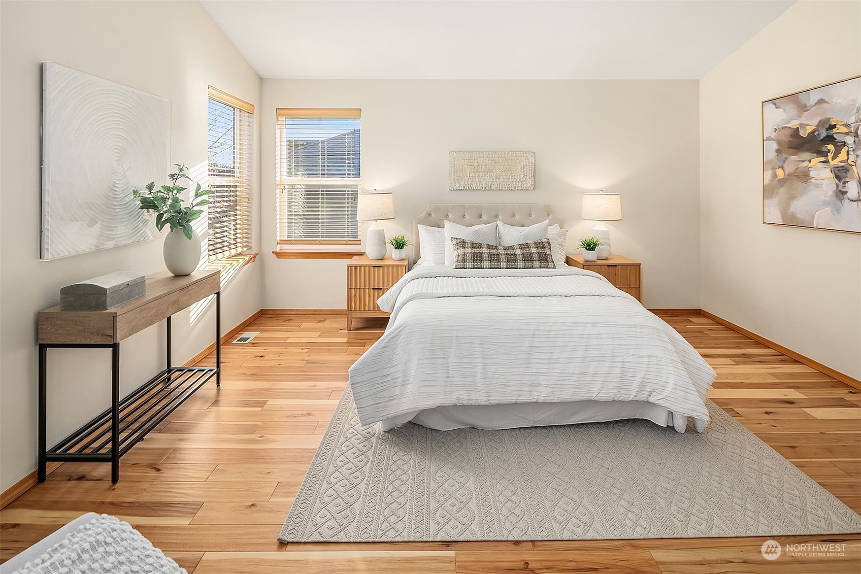 20012 79th Avenue Northeast Kenmore, WA 98028 - Photo 21 of 35 a bedroom with a bed wooden floor and window