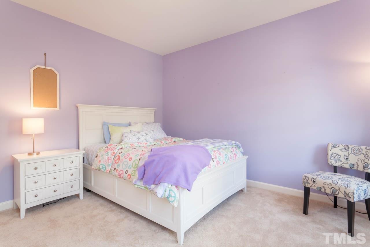 4218 Batiste Road Raleigh, NC 27613 - Photo 24 of 25 LARGE AND SPACIOUS SECONDARY BEDROOM.