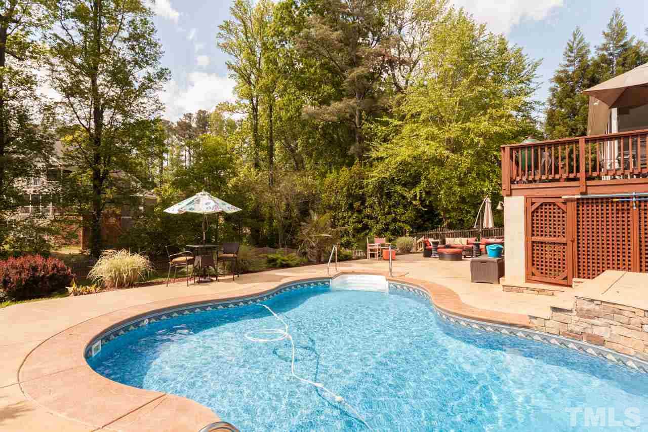 4218 Batiste Road Raleigh, NC 27613 - Photo 6 of 25 SPEND YOUR HOT NC AFTERNOONS RELAXING BY THIS EXQUISITE POOL.