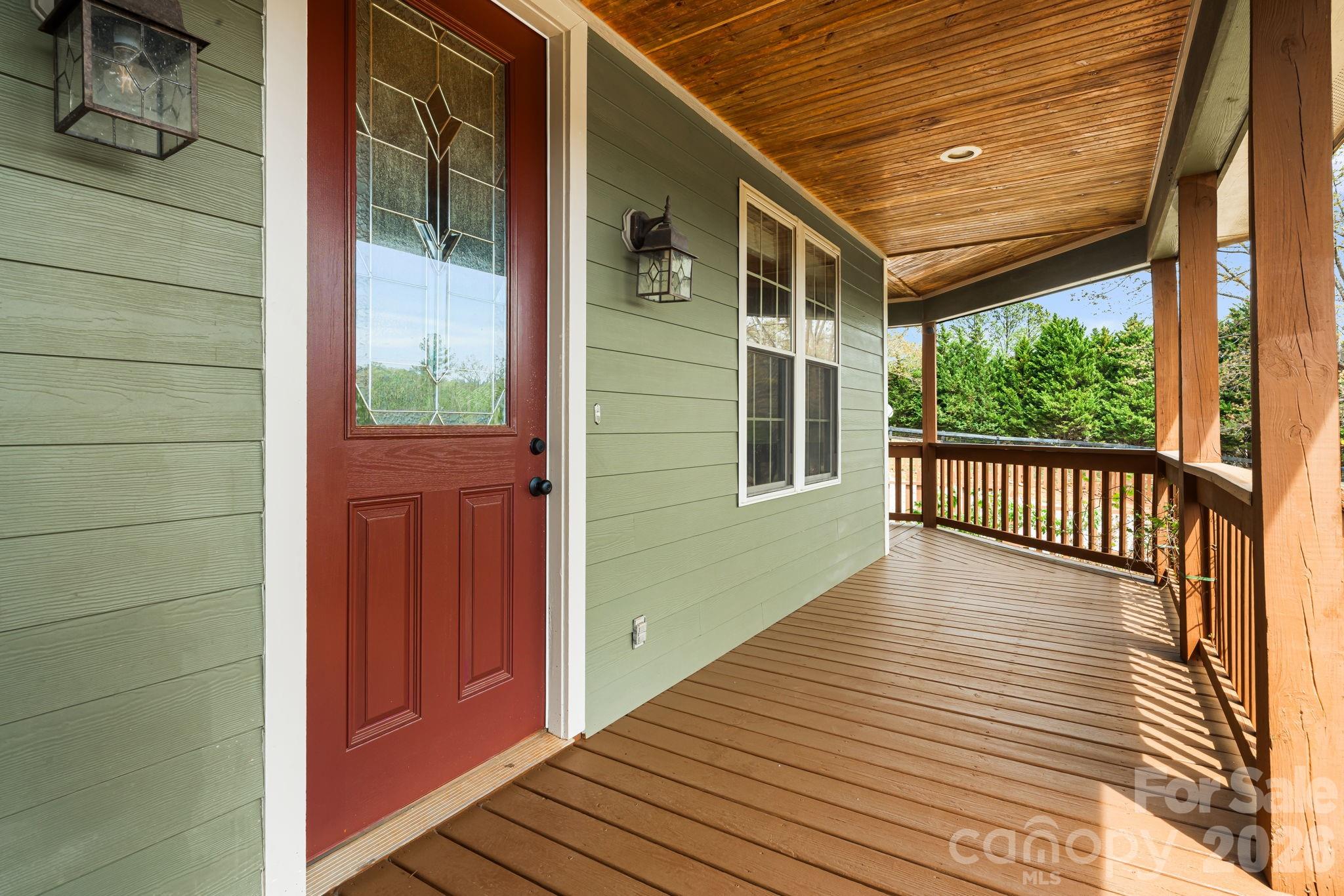 2011 Edgerton Road Mill Spring, NC 28756 - Photo 7 of 31 a view of a balcony with wooden floor