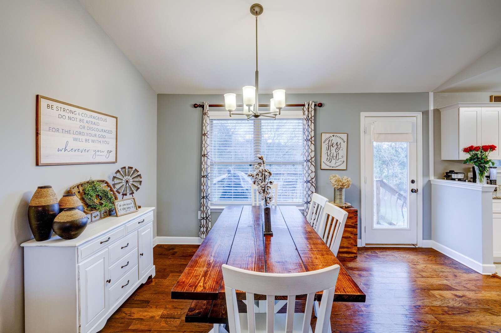 4775 Beasleys Bend Road Lebanon, TN 37087 - Photo 7 of 29 a view of a dining room and livingroom with furniture wooden floor a chandelier