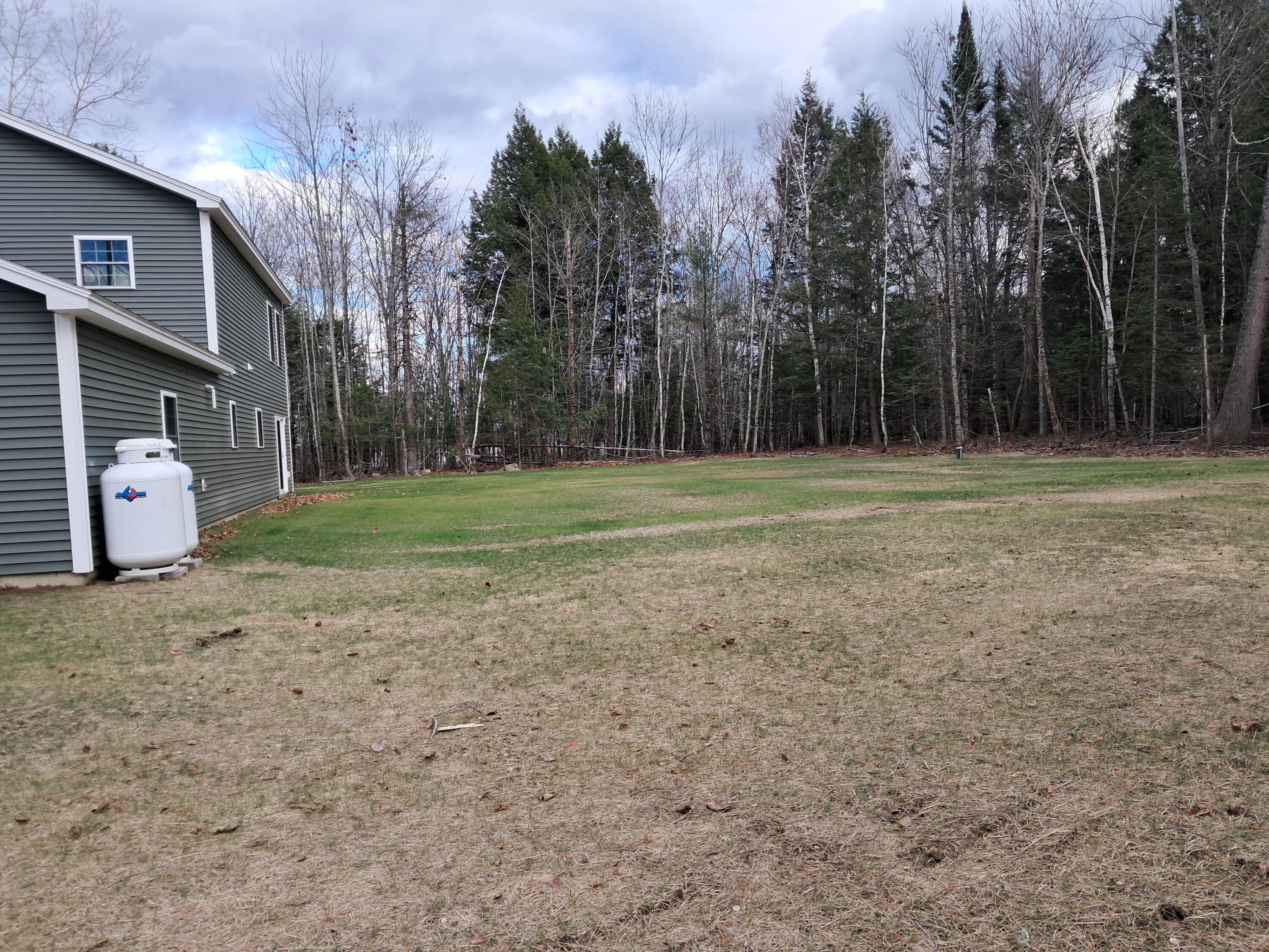 38 Vista Ridge Glenburn, ME 04401 - Photo 3 of 24 Back yard 2