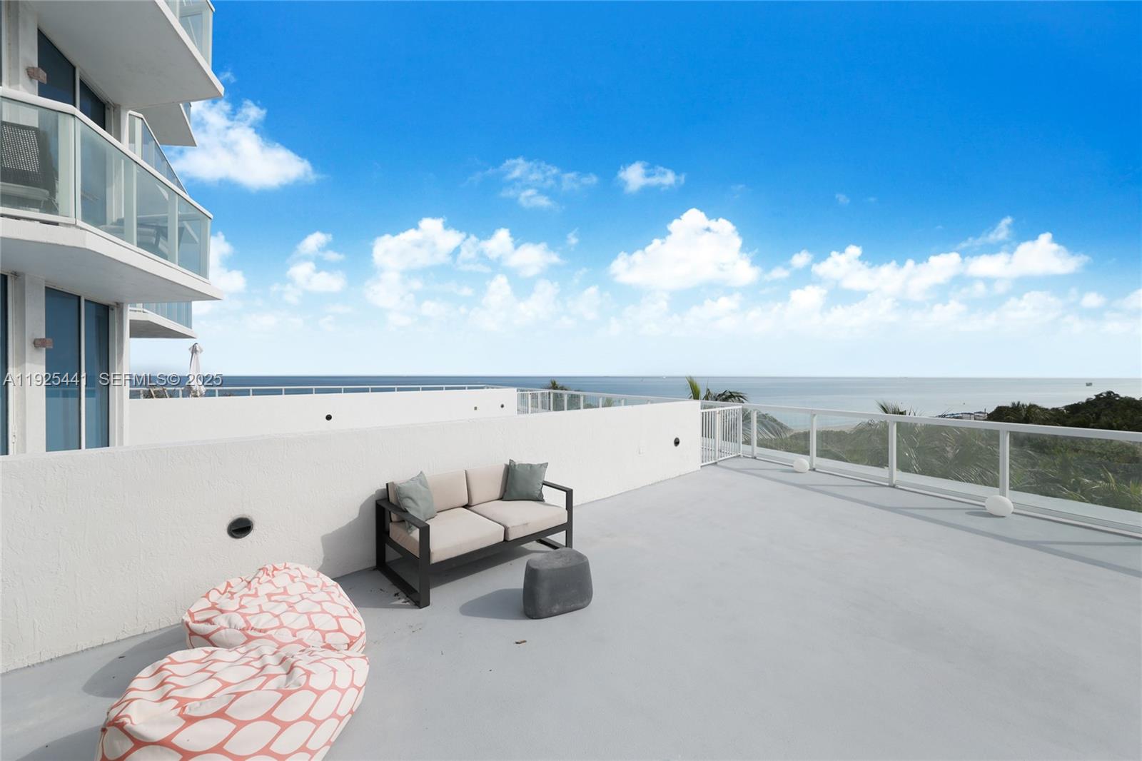 6515 Collins Avenue, Unit 605 Miami Beach, FL 33141 - Photo 14 of 18 a view of terrace with seating space