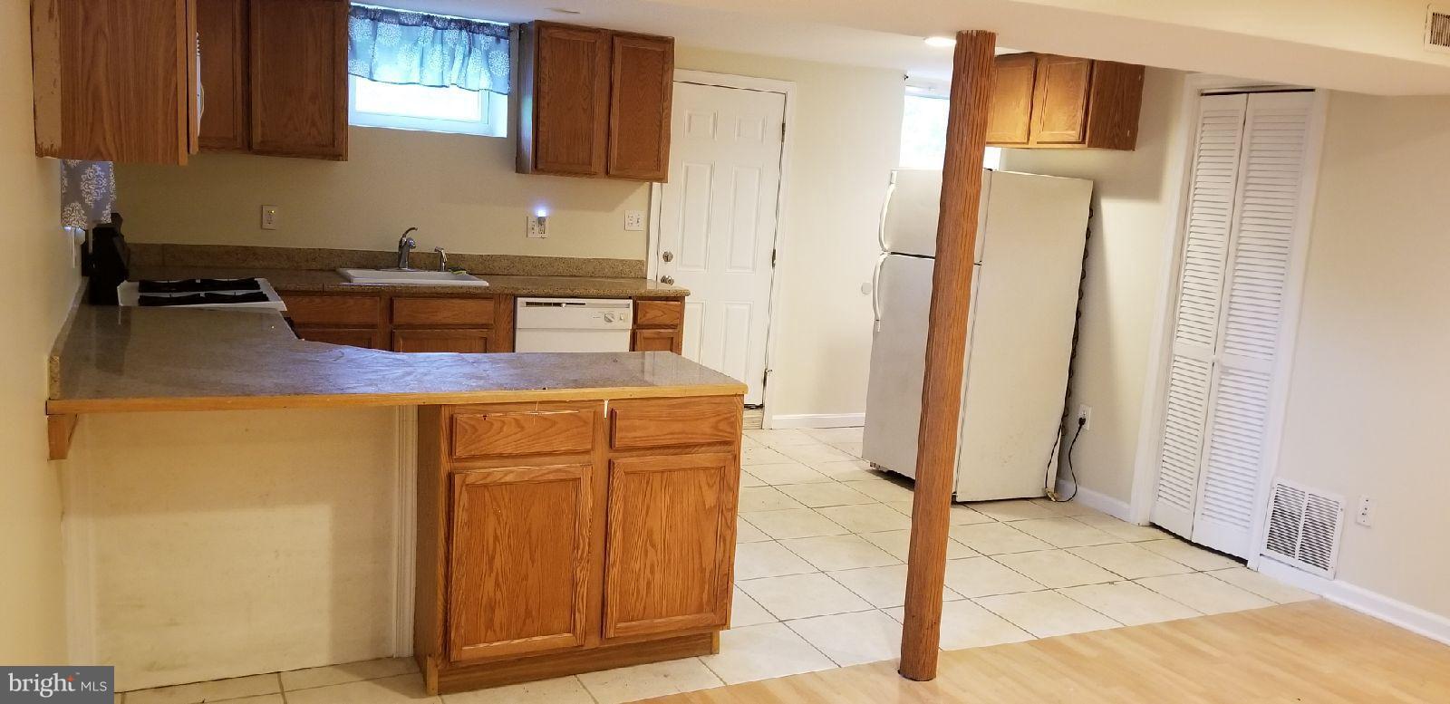 16 Cedarmere Road Owings Mills, MD 21117 - Photo 11 of 13 Basement Kitchen
