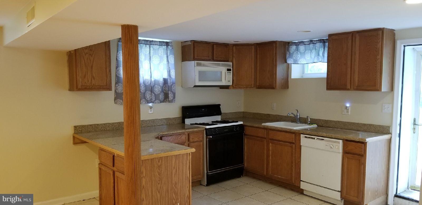 16 Cedarmere Road Owings Mills, MD 21117 - Photo 10 of 13 Basement Kitchen