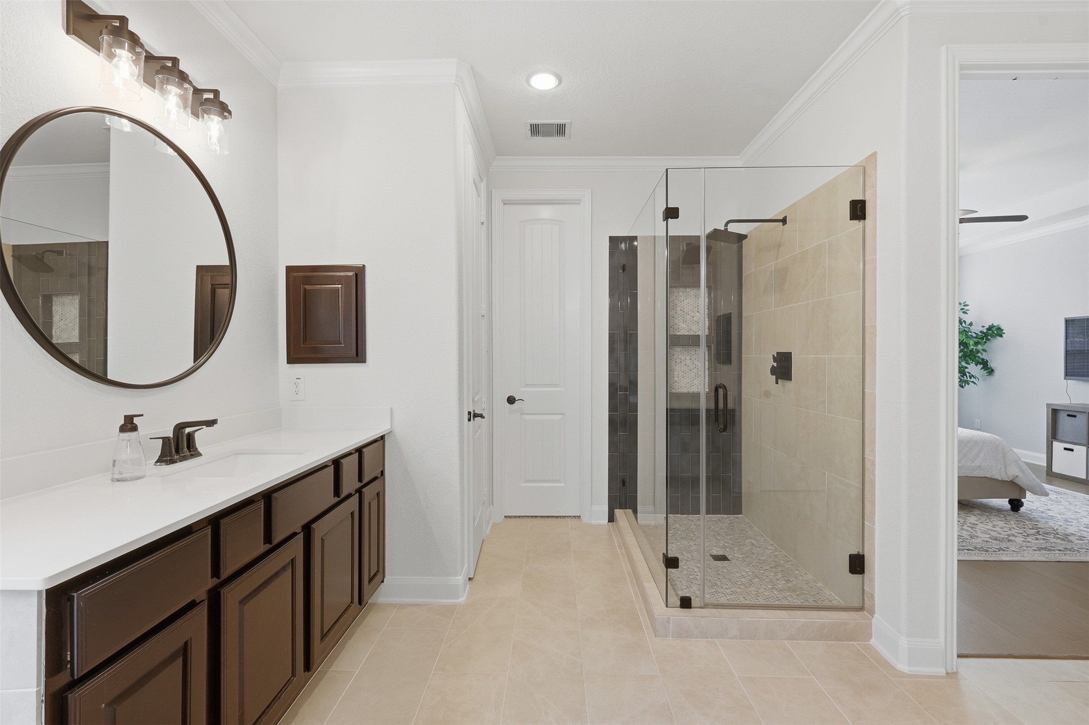 6835 Preston Grove Drive Spring, TX 77389 - Photo 28 of 49 a bathroom with a sink a toilet and shower