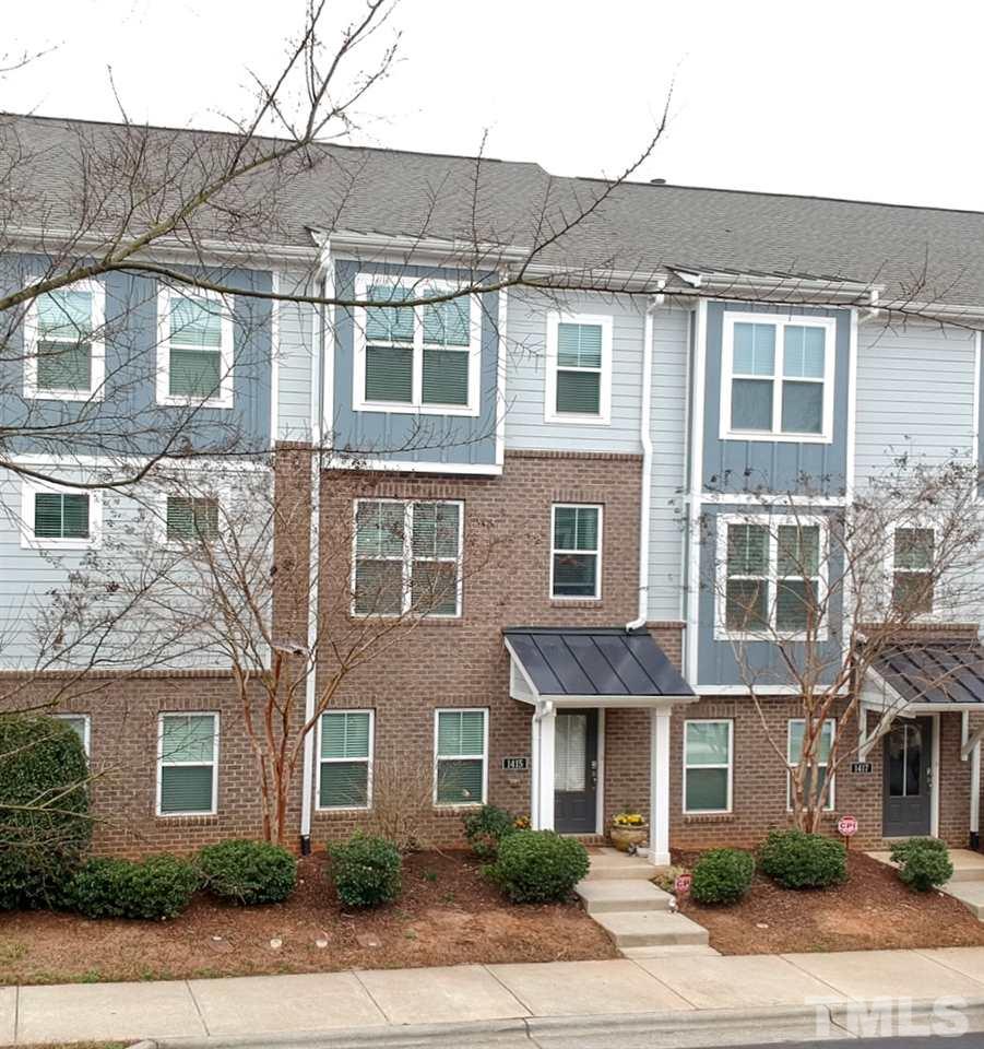 1415 Ardara Lane Raleigh, NC 27607 - Photo 1 of 30 a front view of a building with a yard