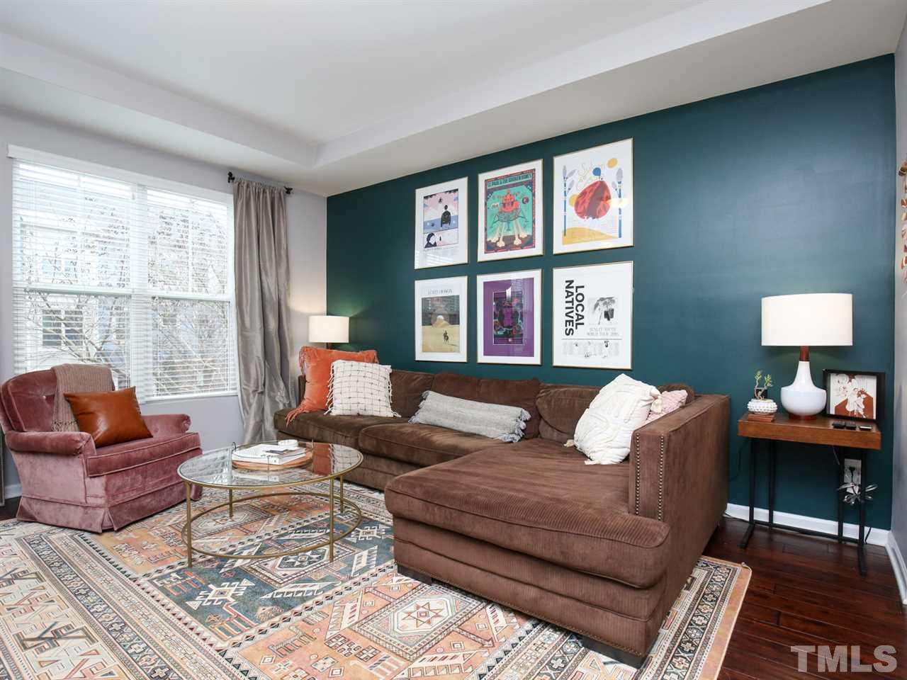1415 Ardara Lane Raleigh, NC 27607 - Photo 10 of 30 a living room with furniture and a large window