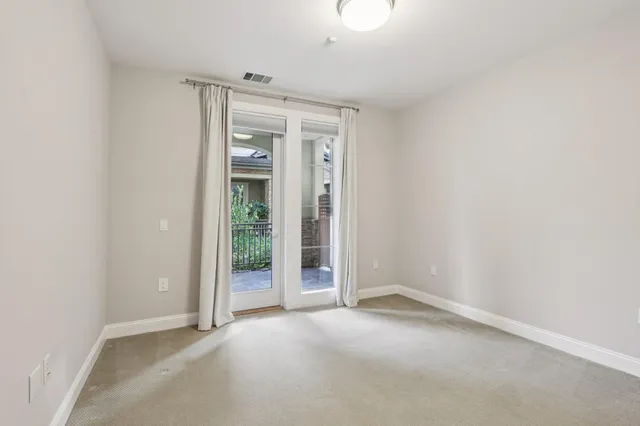 an empty room with entrance door