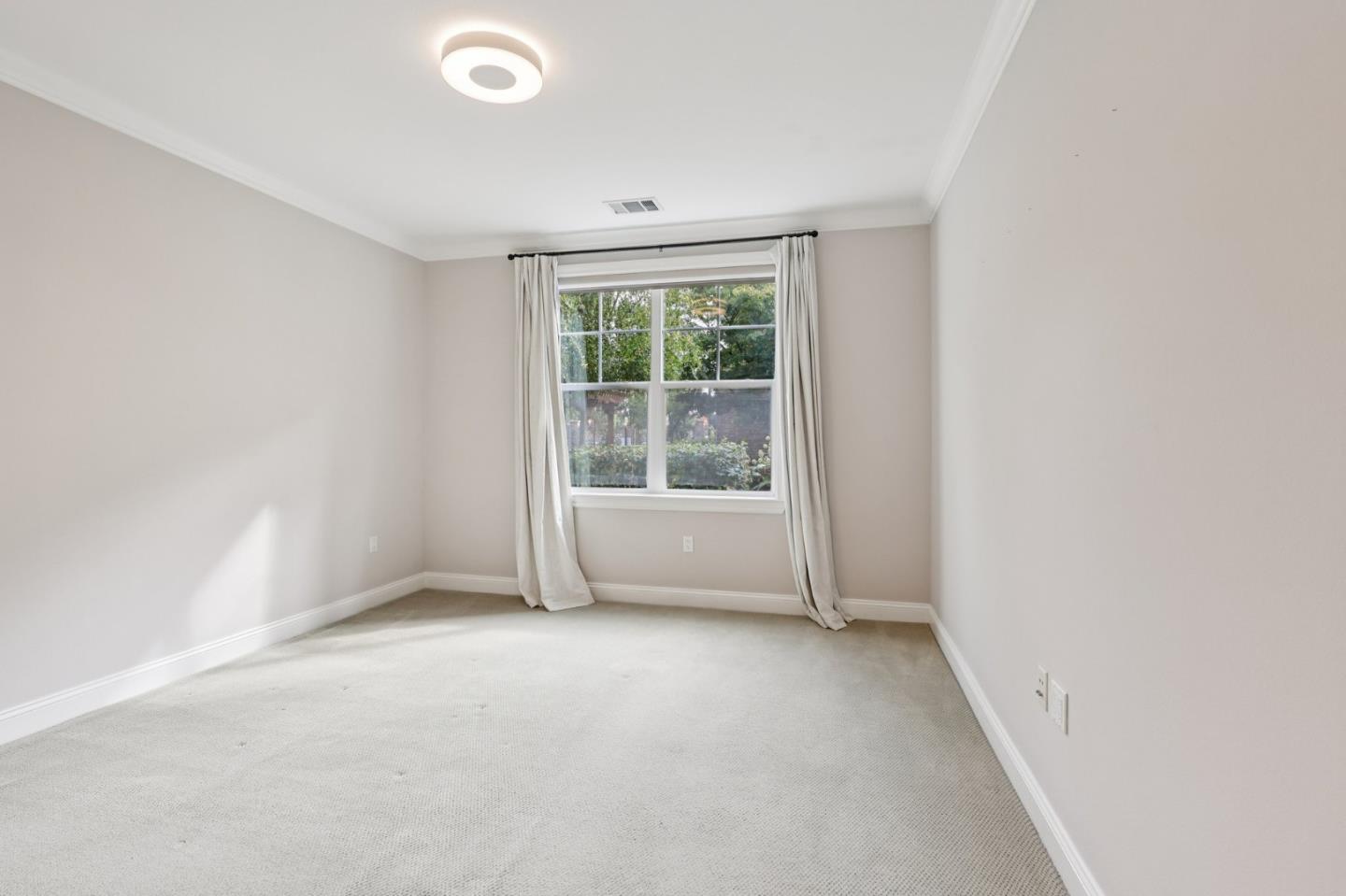 2881 Meridian Avenue, Unit 146 San Jose, CA 95124 - Photo 17 of 35 an empty room with windows