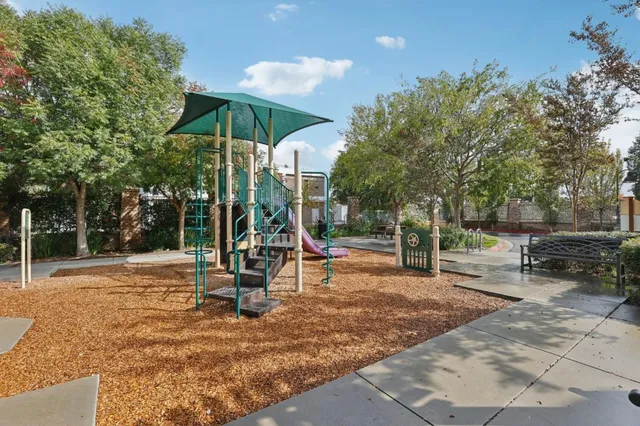 a view of a park with swings