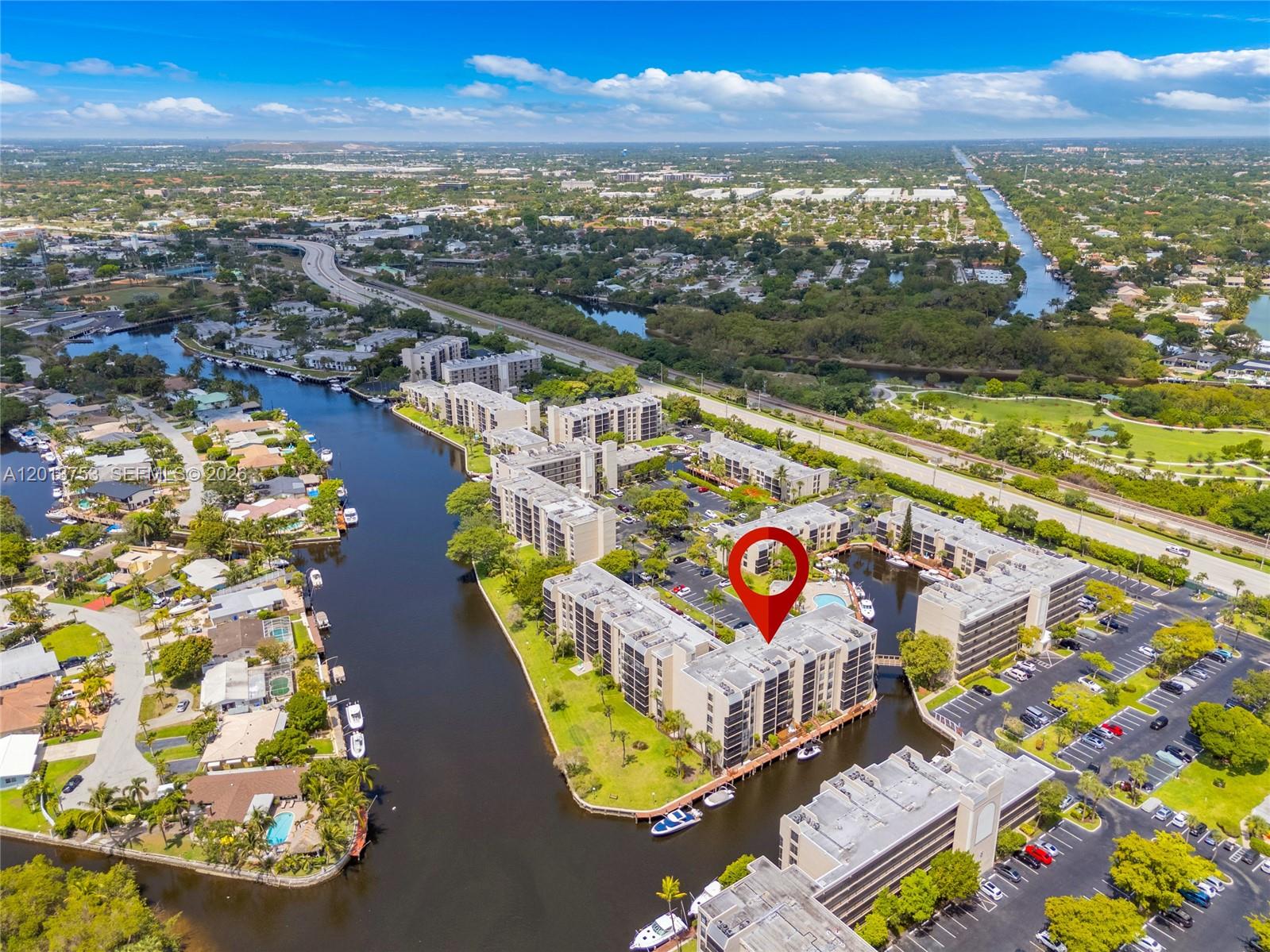 12 Royal Palm Way, Unit 103 Boca Raton, FL 33432 - Photo 17 of 22 an aerial view of residential houses with outdoor space