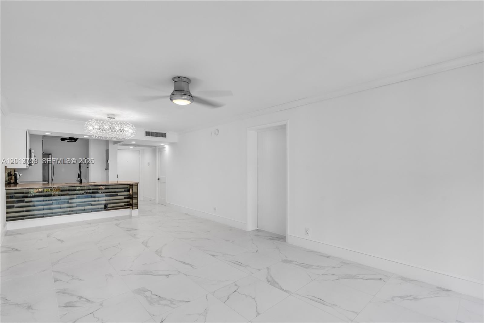 12 Royal Palm Way, Unit 103 Boca Raton, FL 33432 - Photo 6 of 22 wooden floor in an empty room