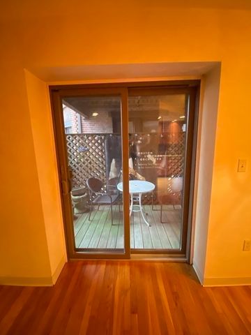 a view of a chairs and table on the wooden floor