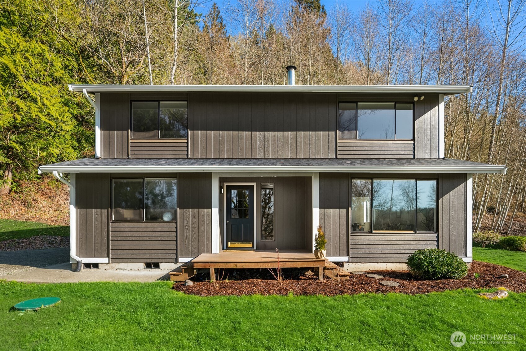 10304 296th Avenue Northeast Carnation, WA 98014 - Photo 11 of 35 a view of a house with backyard and garden