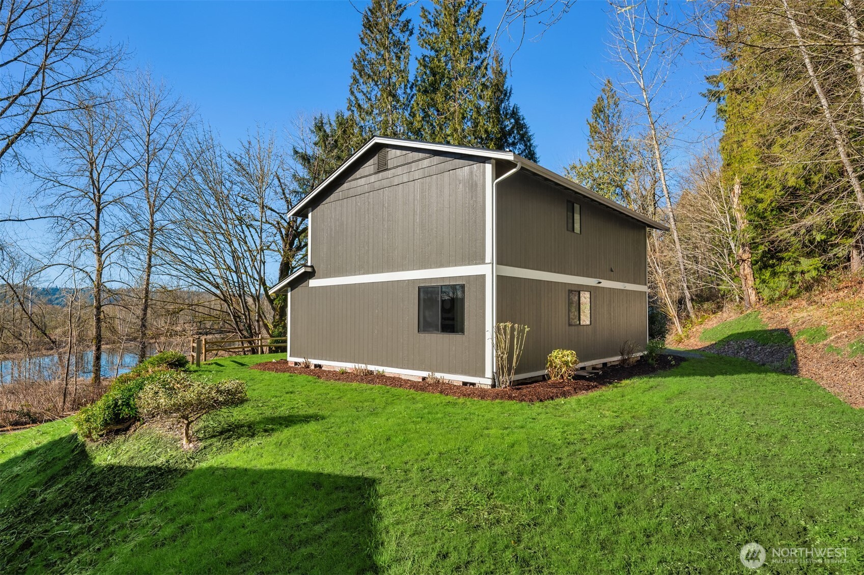 10304 296th Avenue Northeast Carnation, WA 98014 - Photo 12 of 35 a view of a backyard with plants and a garden