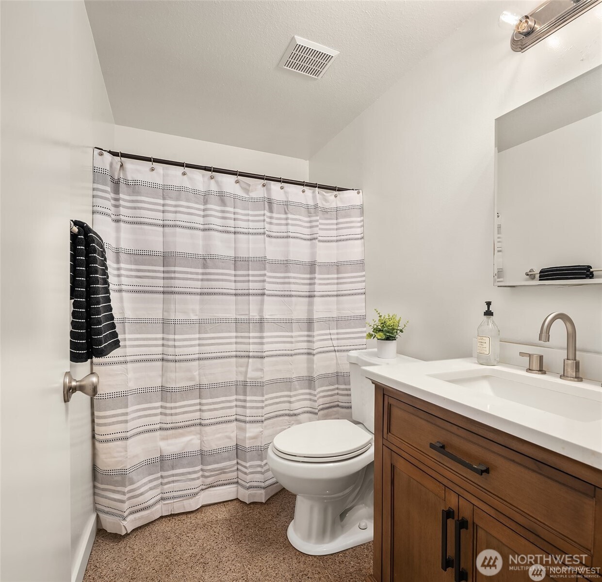 10304 296th Avenue Northeast Carnation, WA 98014 - Photo 15 of 35 a bathroom with a toilet a sink and shower