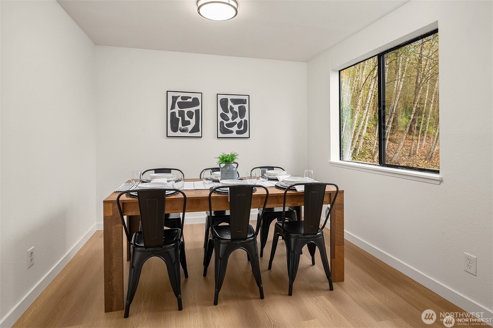 10304 296th Avenue Northeast Carnation, WA 98014 - Photo 19 of 35 a view of a dining room with furniture and window